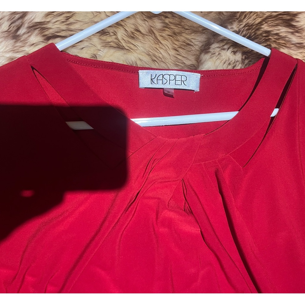 Red long sleeve casual shirt.